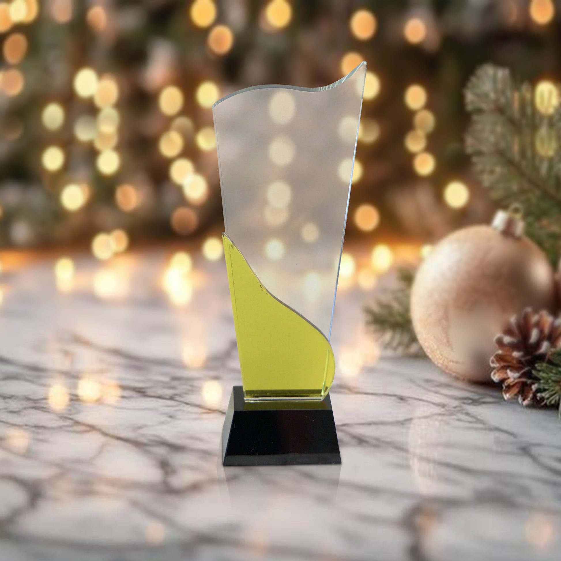 Crystal award with yellow accent and black base
